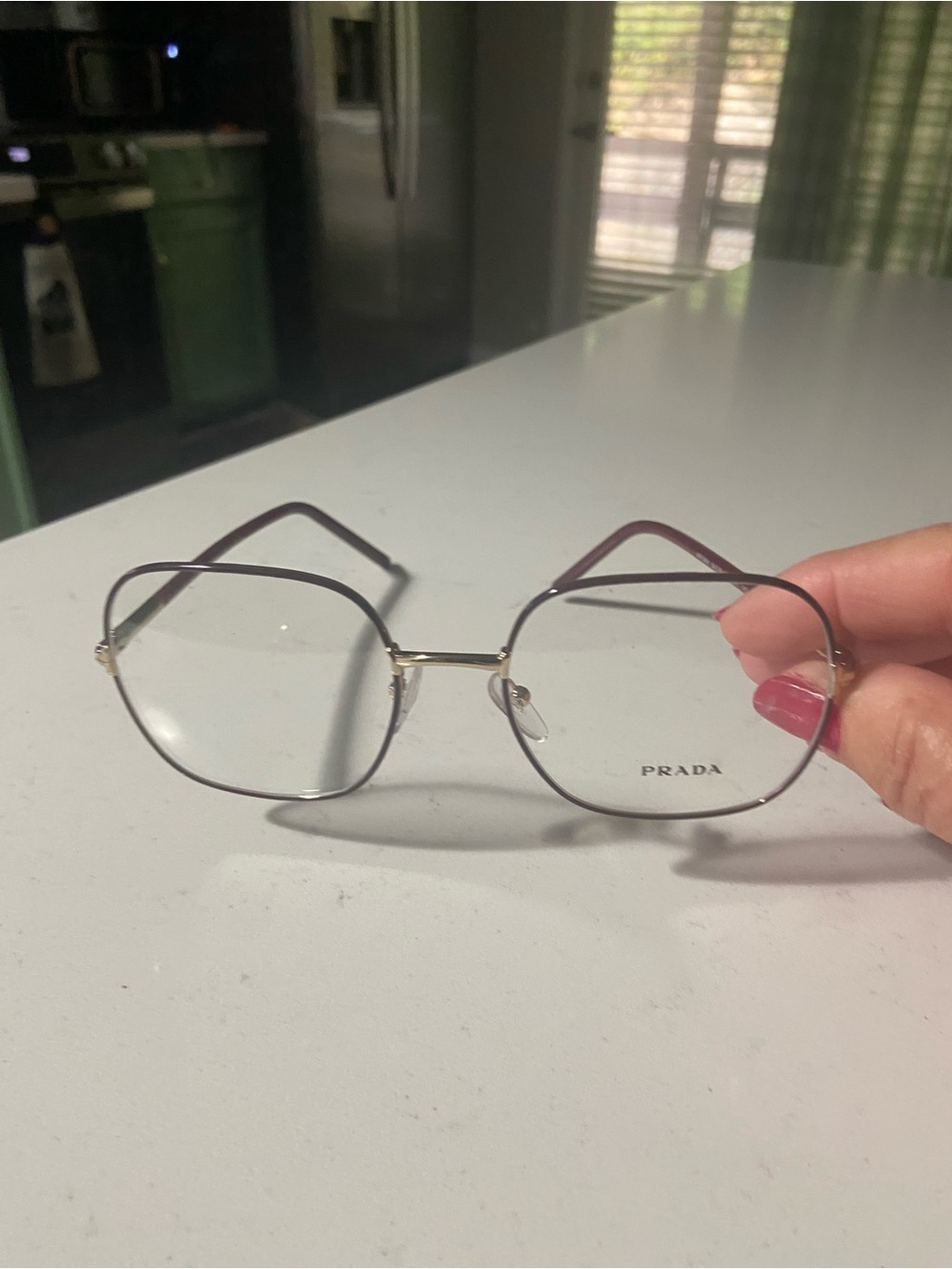 Prada Women’s Octagonal Metal Frame Glasses in Gold and Brown